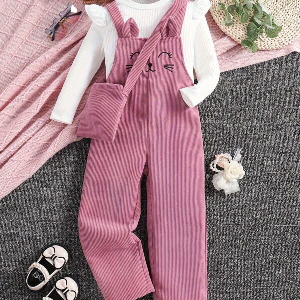 Adorable little girl wearing a playful cat embroidered jumpsuit perfect for spring or autumn The jumpsuit is comfortable and stylish