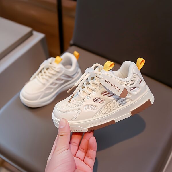 Stylish and breathable Newness Summer Breeze Kids Stripe Sneakers, perfect for spring, summer, and fall. Image shows kids' striped sneakers in a close-up.