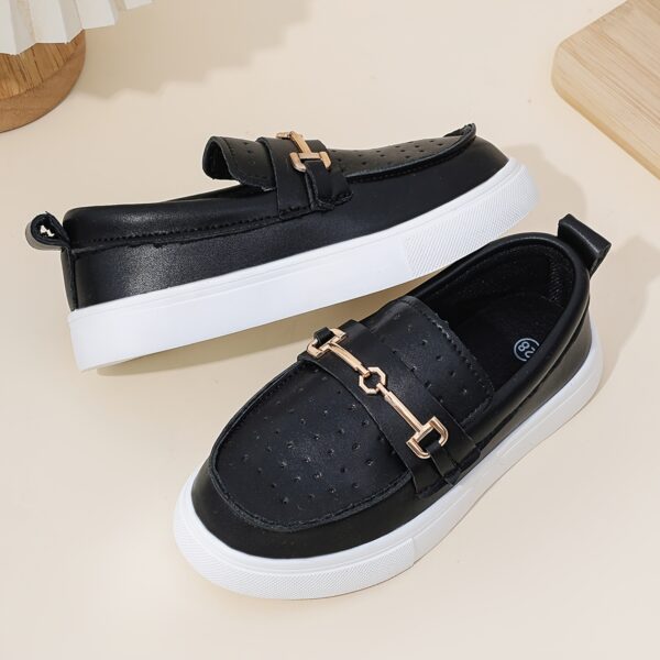 Stylish perforated boys loafers, perfect for any occasion. Comfortable and breathable design in a classic style.