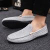 Newness Metropolitan Mens Slip On Loafers in classic black featuring breathable fabric a durable PU sole and stylish golden accents Perfect for everyday wear