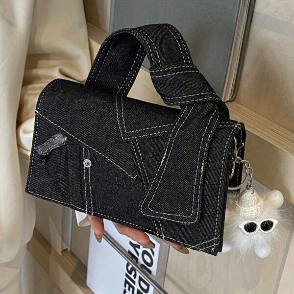 Newness Nomad Two-Tone Denim Crossbody bag, stylish and durable everyday denim crossbody bag in two tone denim, shown against a neutral background.