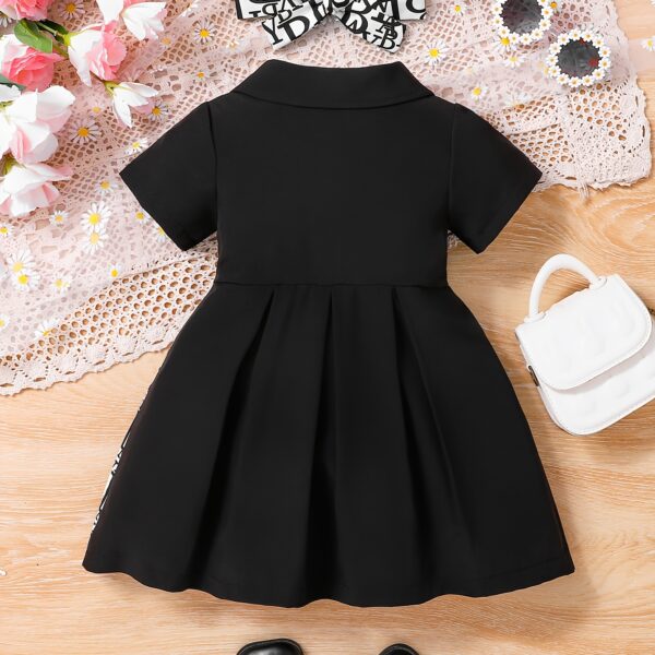Adorable baby girl in a stylish and comfortable summer dress from Newness, perfect for a playdate.