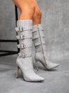 Newness Ascension Stiletto Buckle Boots Elevate your look with these stunning stiletto boots featuring a chic buckle detail