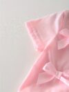 Adorable girls denim set with sweetheart neckline and bow detail perfect for playdates or school