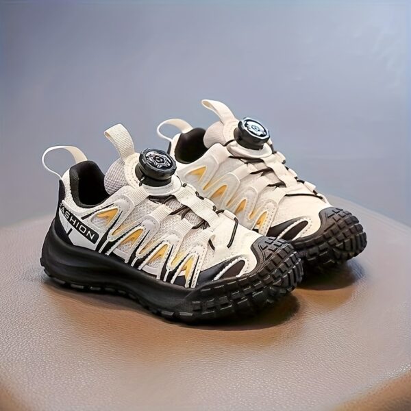 Stylish and comfortable Velocity Boys' Sneakers in multiple colors, perfect for any occasion. Showcasing the sneaker's design details and fit.