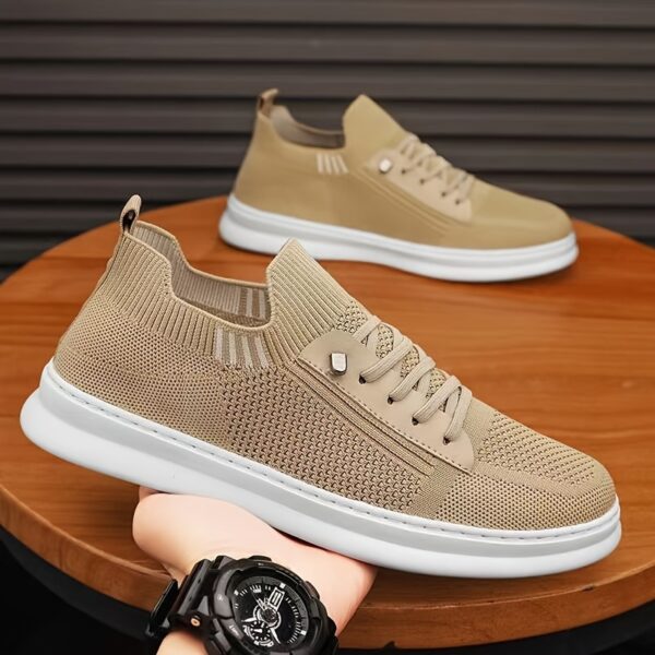 Newness Urban Trek Breathable Men's Slip-On Sneakers: Lightweight and stylish slip-on sneakers perfect for everyday wear. Comfortable and breathable design in a versatile color.
