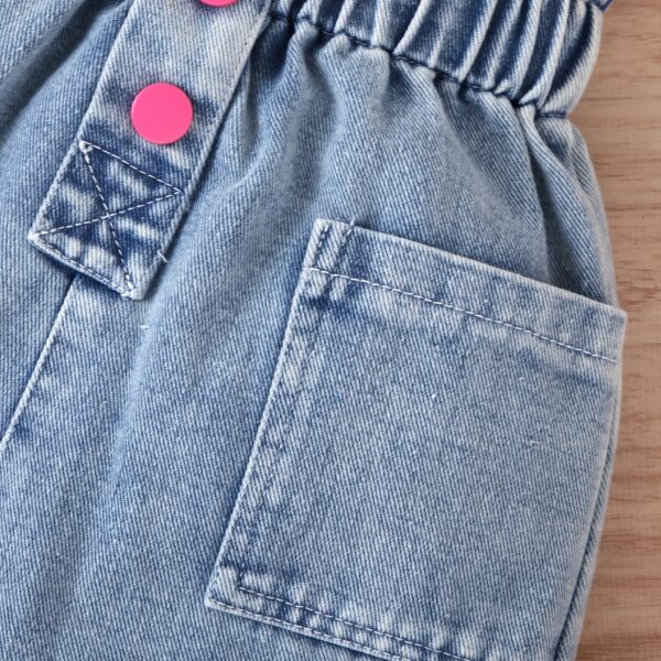 Adorable girls denim set from Newness, perfect for spring, summer, or fall. Features a stylish design and comfortable fit.