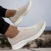 Newness Urban Trek Mens Slip On Sneakers in stylish minimalist design showcasing breathable comfort and effortless style