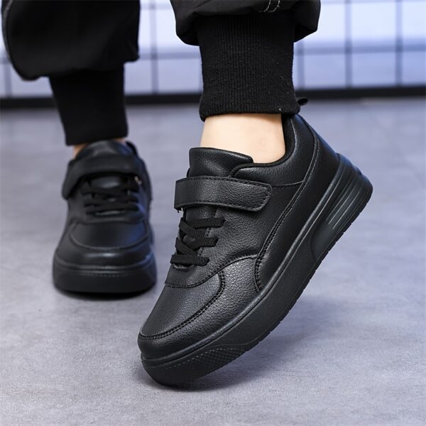 Stylish and comfortable black sneakers for kids perfect for everyday wear Shop the Everyday Black Sneakers at Newness