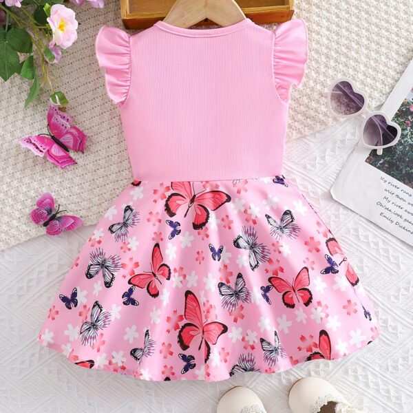 Adorable baby girl in a lavender butterfly dress, perfect for summer. Newness.