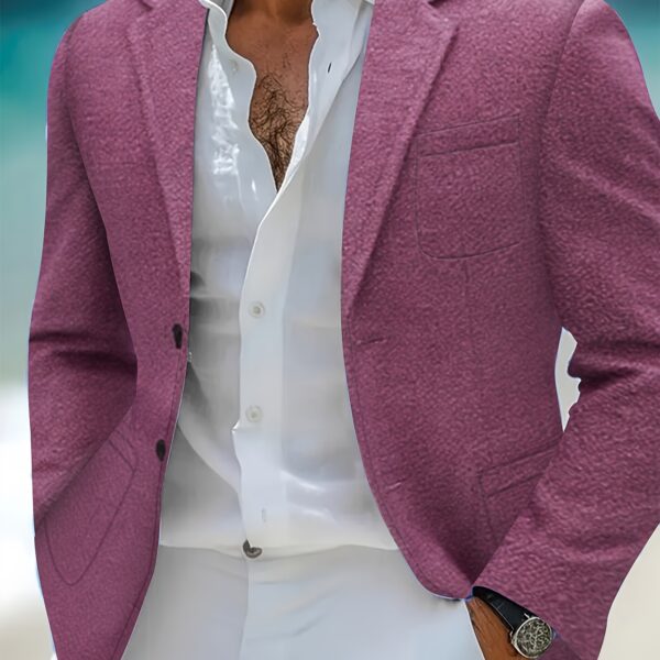 The Newness Riviera Men's Casual Suit Jacket: A stylish and comfortable navy blue casual suit jacket, perfect for elevating your everyday look. Model wears a size medium.