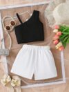 Adorable Summer Bloom floral shorts set in a vibrant print perfect for outdoor play Model is wearing the matching shorts and top