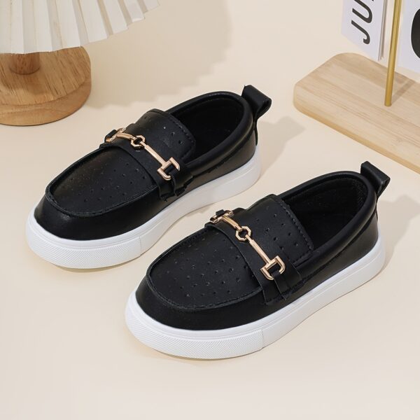 Stylish perforated boys loafers, perfect for any occasion. Comfortable and breathable design in a classic style.