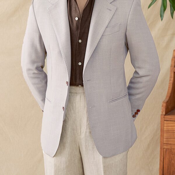 Men's Slim-Fit Lightweight Blazer in navy blue, showcasing the notched lapel, button front, and slim fit.