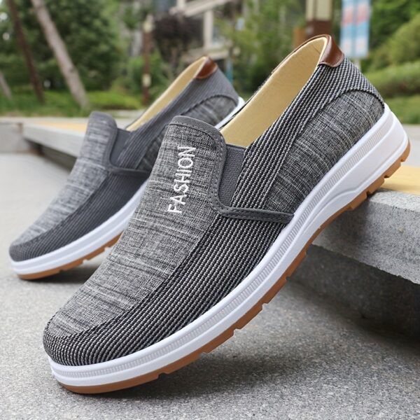 Newness Mens Striped Loafers Breathable fabric loafers with a stylish striped design perfect for everyday wear