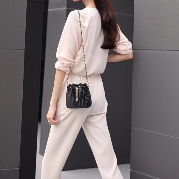 Newness Chic Pleated Drawstring Bag: Versatile and chic pleated bag, perfect for any occasion.