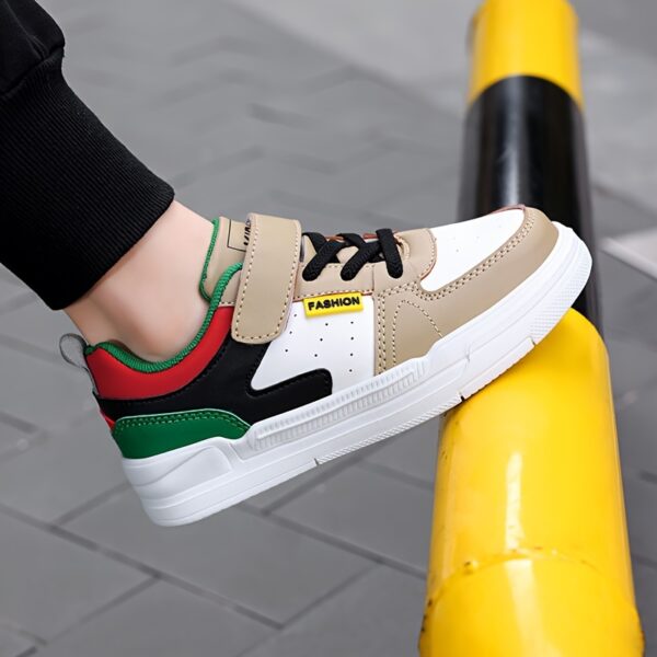 Stylish boys Colorblock Stripe Sneakers by Newness perfect for active kids Featuring a vibrant colorblock design and comfortable striped detailing