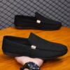Newness Metropolitan Mens Slip On Loafers in classic black featuring breathable fabric a durable PU sole and stylish golden accents Perfect for everyday wear