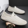 Newness Urban Explorer Mens Knit Sneakers Breathable lightweight knit sneakers in grey perfect for everyday wear Showcase of comfort and style