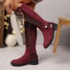 Newness Crimson V Chain Burgundy Knee Boots Elevate your style with these luxurious burgundy knee high boots featuring a striking V chain detail