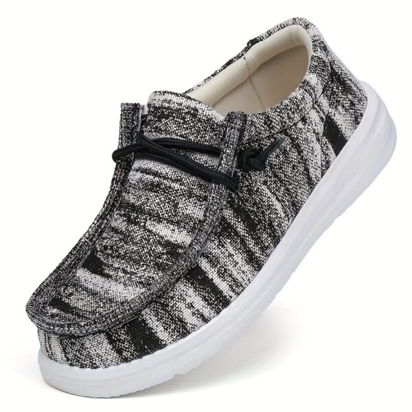 Stylish Newness Striped Canvas Kids' Slip-Ons in classic navy and white stripes. Lightweight and breathable, perfect for kids' everyday wear.