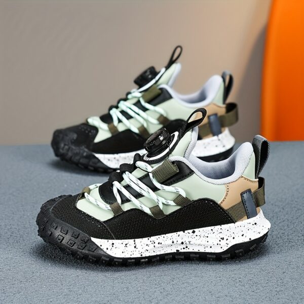 Stylish and comfortable Velocity Boys' Sneakers in multiple colors, perfect for any occasion. Showcasing the sneaker's design details and fit.