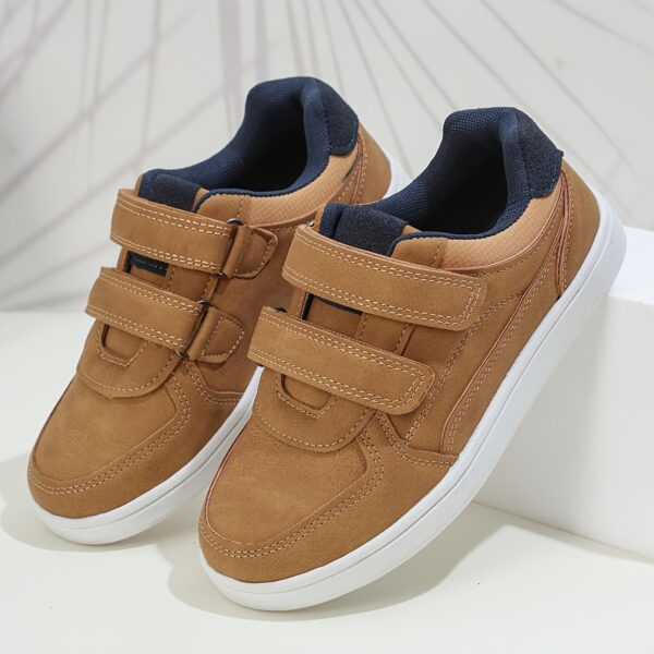 Stride Rite Boys' Sneakers from Newness: All-day comfort and style for active boys. Durable, stylish sneakers perfect for play and everyday wear.