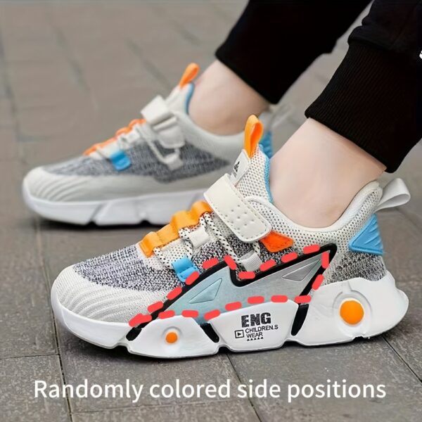 Stylish and breathable Color Block Boys Running Shoes from Newness, perfect for active kids. The shoes feature a vibrant color block design.
