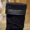 Newness Slouchy Knee High Boots in brown leather showcasing a chic and casual style perfect for winter The boots are slouchy and knee high highlighting their comfortable and fashionable design
