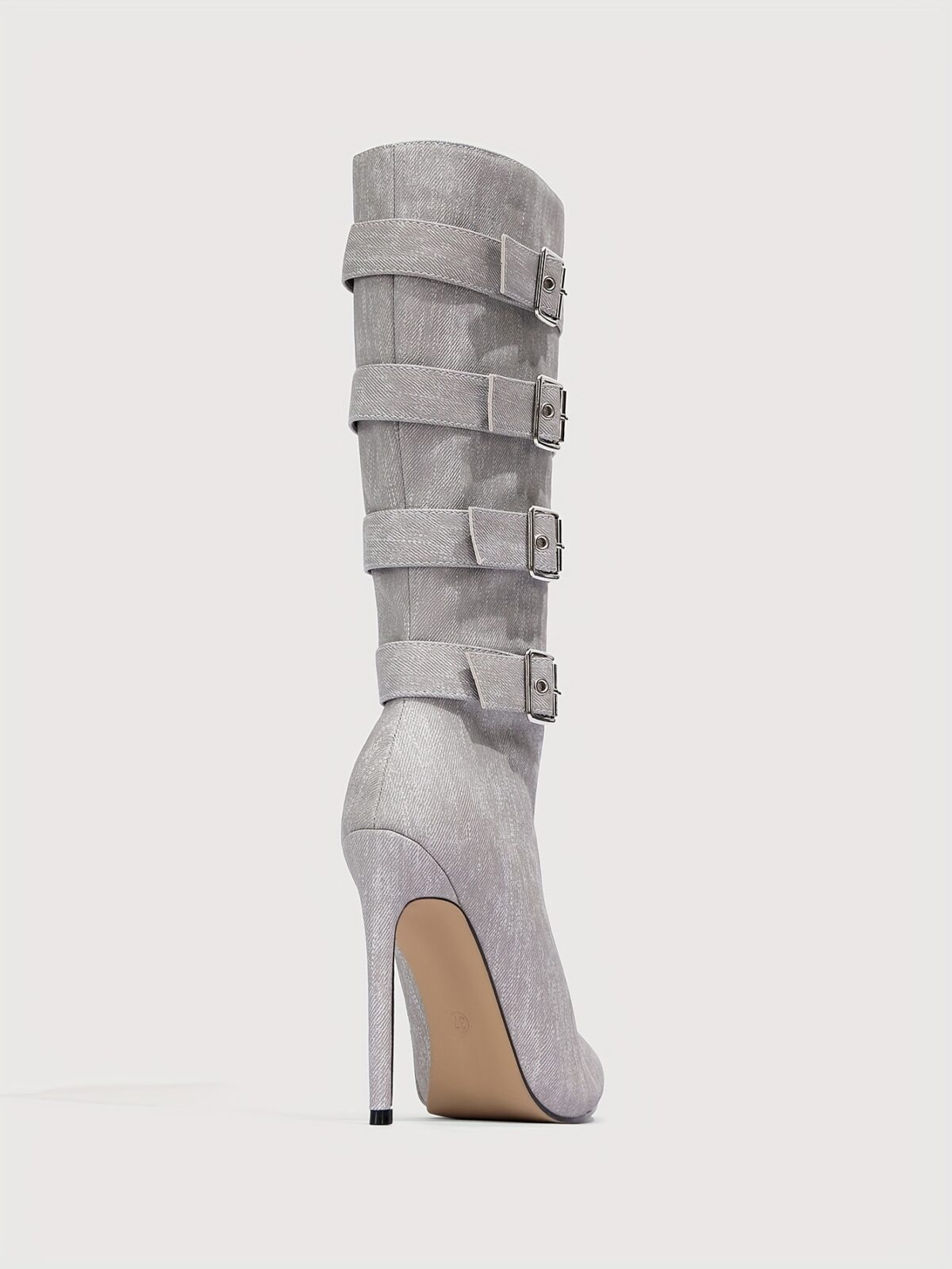 Newness Ascension Stiletto Buckle Boots Elevate your look with these stunning stiletto boots featuring a chic buckle detail