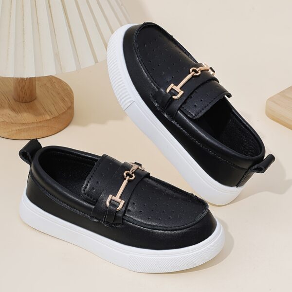 Stylish perforated boys loafers, perfect for any occasion. Comfortable and breathable design in a classic style.