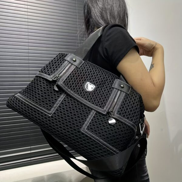 Newness Urban Edge Mesh Nylon Bag: A stylish and durable mesh nylon bag, perfect for everyday use. Shows off its modern design and spacious interior.