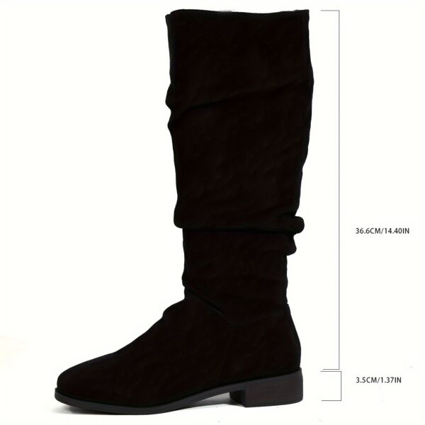 Newness Slouchy Suede Mid-Calf Boots in rich brown suede leather, showcasing the comfortable slouchy fit and mid-calf height. Perfect for adding a touch of effortless chic to any winter outfit.