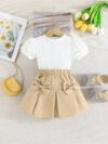 Adorable Pastel Dream Girls Summer Set featuring a pastel colored top and bottom perfect for summer The outfit is shown on a young girl highlighting its comfortable and stylish design