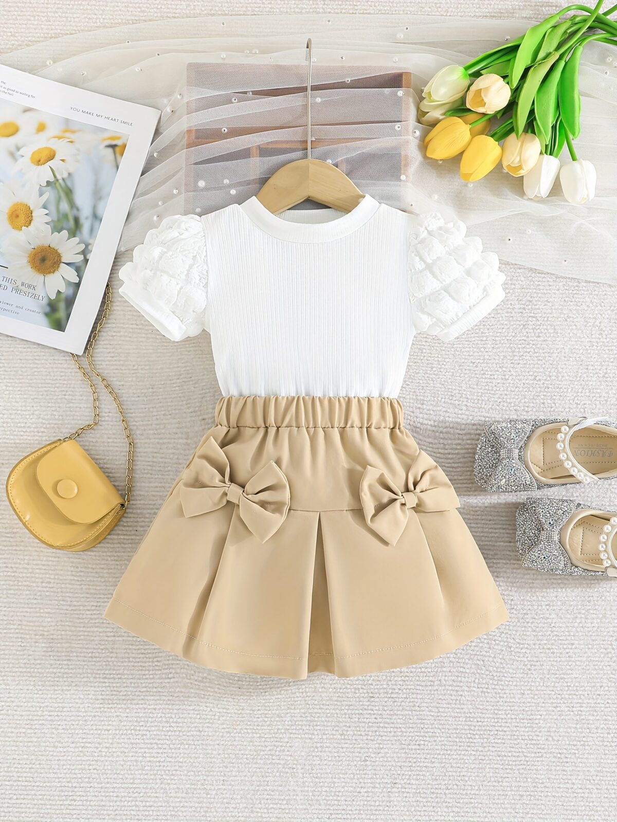 Adorable Pastel Dream Girls Summer Set featuring a pastel colored top and bottom perfect for summer The outfit is shown on a young girl highlighting its comfortable and stylish design