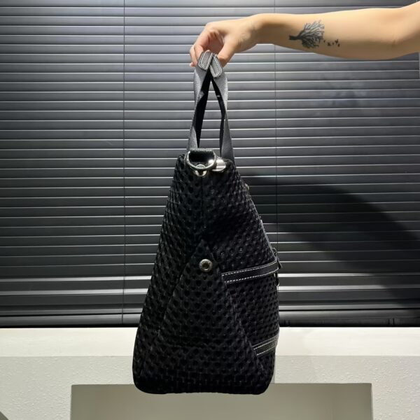 Newness Urban Edge Mesh Nylon Bag: A stylish and durable mesh nylon bag, perfect for everyday use. Shows off its modern design and spacious interior.