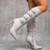 Newness Ascension Stiletto Buckle Boots Elevate your look with these stunning stiletto boots featuring a chic buckle detail