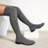 Newness Sculptural Knit Knee High Boots Womens stylish knee high boots in a form fitting knit fabric Showcase your legs in these trendy boots perfect for fall and winter