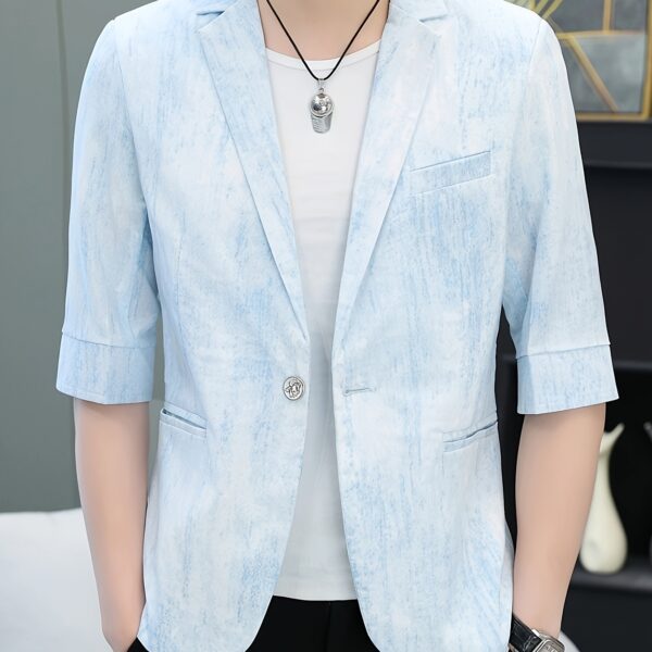 The Newness Dubai Breeze Men's Summer Blazer in a stylish pose on a model.