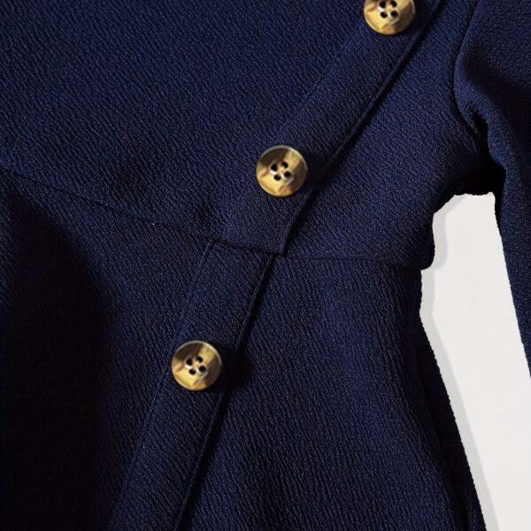 Adorable Newness Little Sailor Navy Blue Dress, perfect for any occasion. A charming navy blue dress with sailor-inspired details.