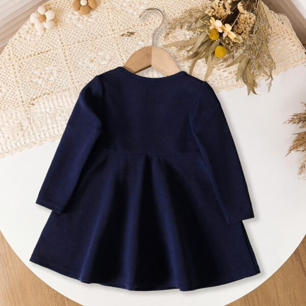 Adorable Newness Little Sailor Navy Blue Dress, perfect for any occasion. A charming navy blue dress with sailor-inspired details.