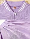 Lilac leopard heart varsity jacket and skirt set Stylish girls outfit featuring a lilac jacket with heart details and a leopard print skirt Perfect for fallwinter