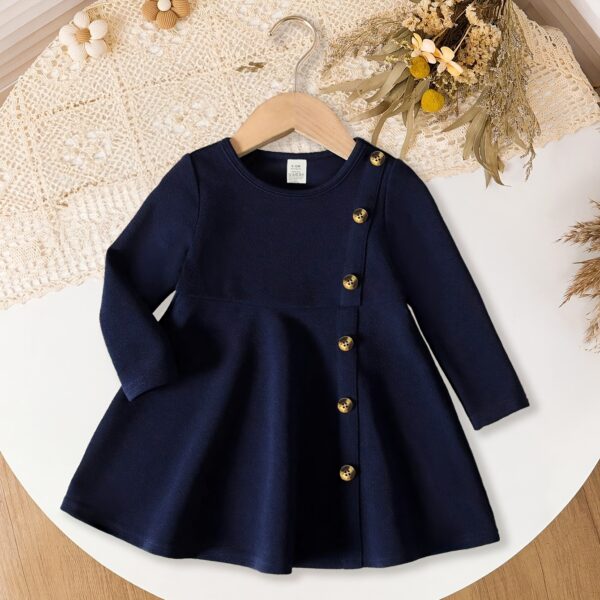 Adorable Newness Little Sailor Navy Blue Dress, perfect for any occasion. A charming navy blue dress with sailor-inspired details.