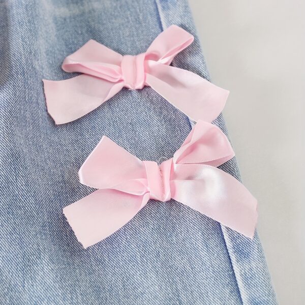 Adorable Pastel Dreams Girls' Bow Set in pastel colors, perfect for back-to-school or special occasions.