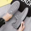 Newness Urban Explorer Mens Knit Sneakers Breathable lightweight knit sneakers in grey perfect for everyday wear Showcase of comfort and style