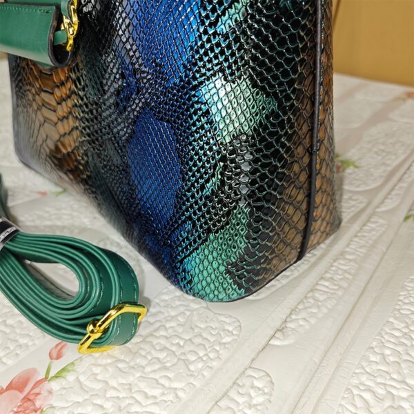 Emerald Envy Snakeskin Crossbody Bag by Newness. A chic, modern, and luxuriously designed crossbody bag in emerald green snakeskin.