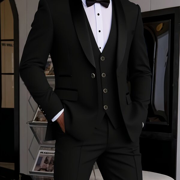 Model wearing the Newness Apex Slim Fit Tuxedo, a sophisticated black tuxedo with a modern slim fit, ideal for weddings and formal events.