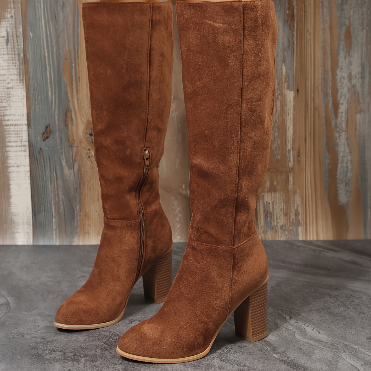 Newness Desert Bloom Western Knee Boots: Stunning brown leather knee-high boots with intricate stitching and subtle floral accents.