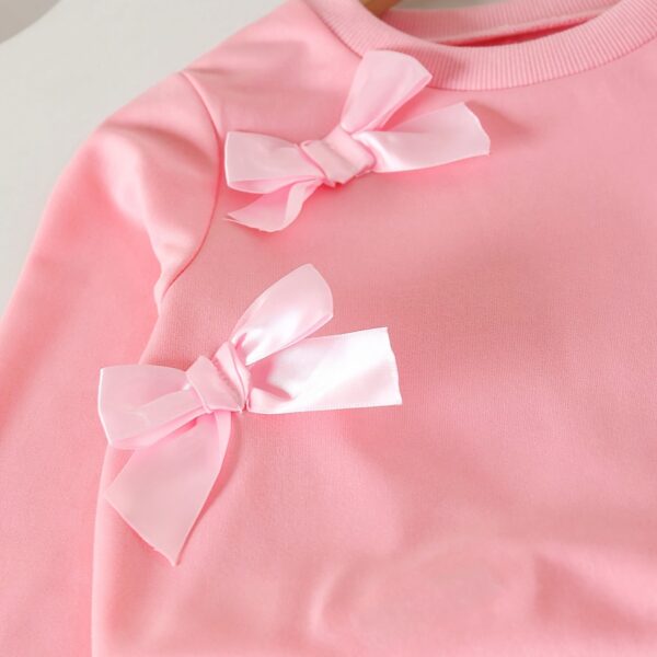 Adorable Pastel Dreams Girls' Bow Set in pastel colors, perfect for back-to-school or special occasions.