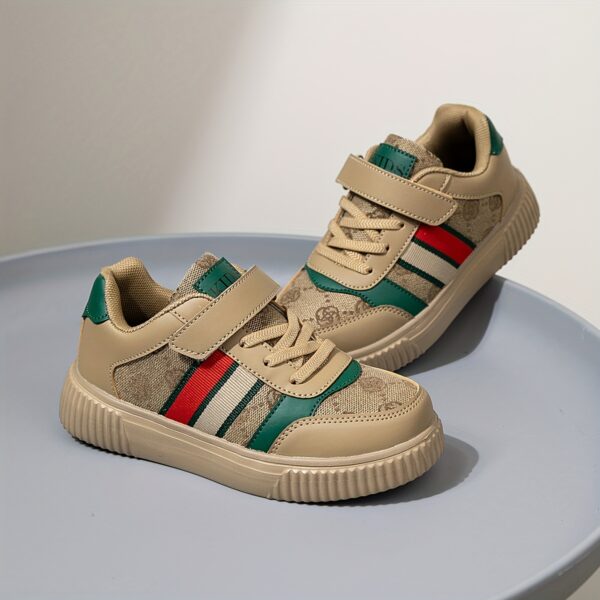 Stylish and vibrant color-block striped kids' sneakers by Newness. Lightweight and durable, perfect for everyday wear.